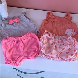 Carters newborn outfit lot.